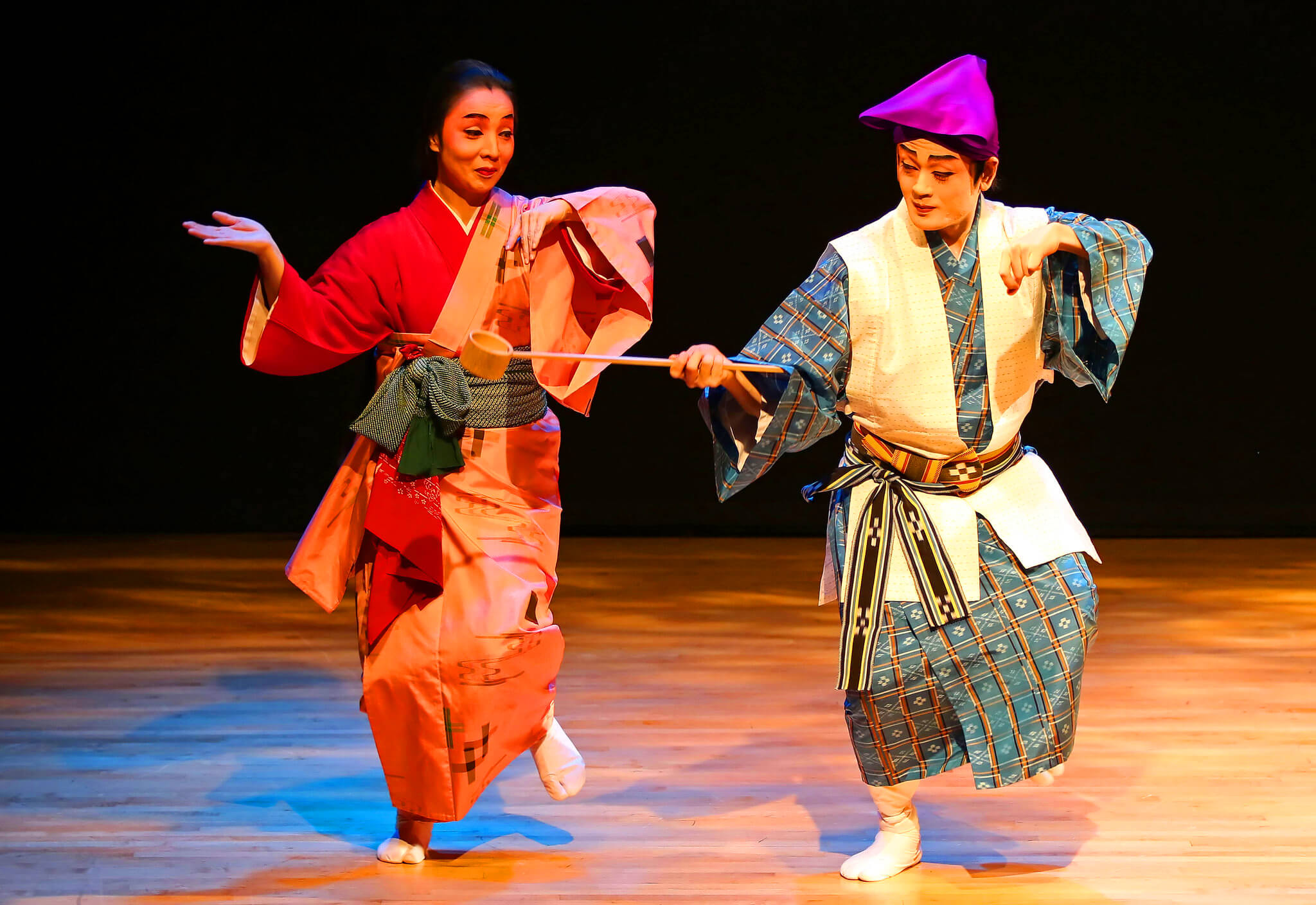Japanese contemporary dancers performing on modern stage